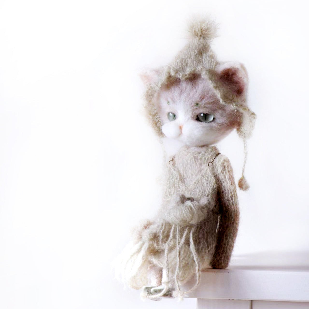 Chat magicien tricoté en feutre de laine