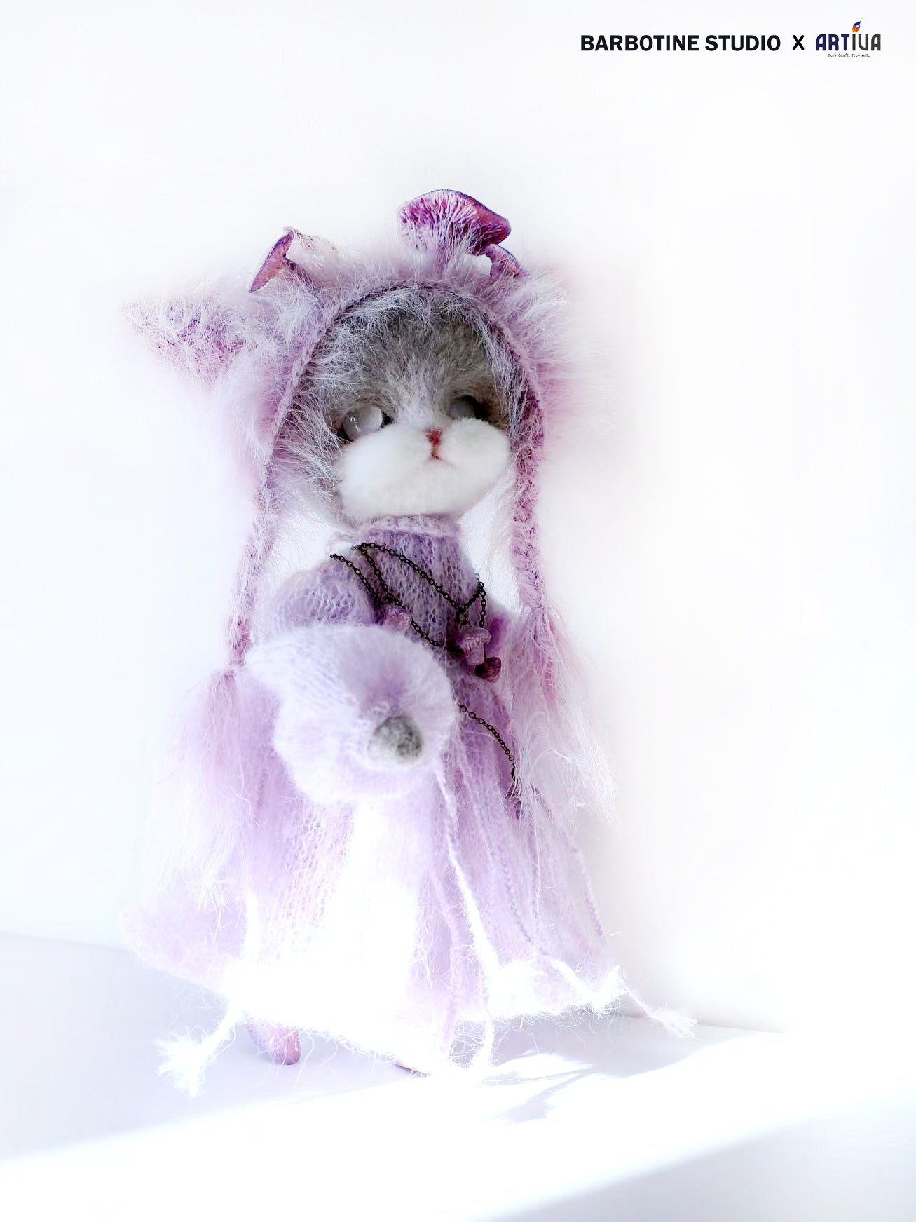 Chat magicien rose tricoté en feutre de laine